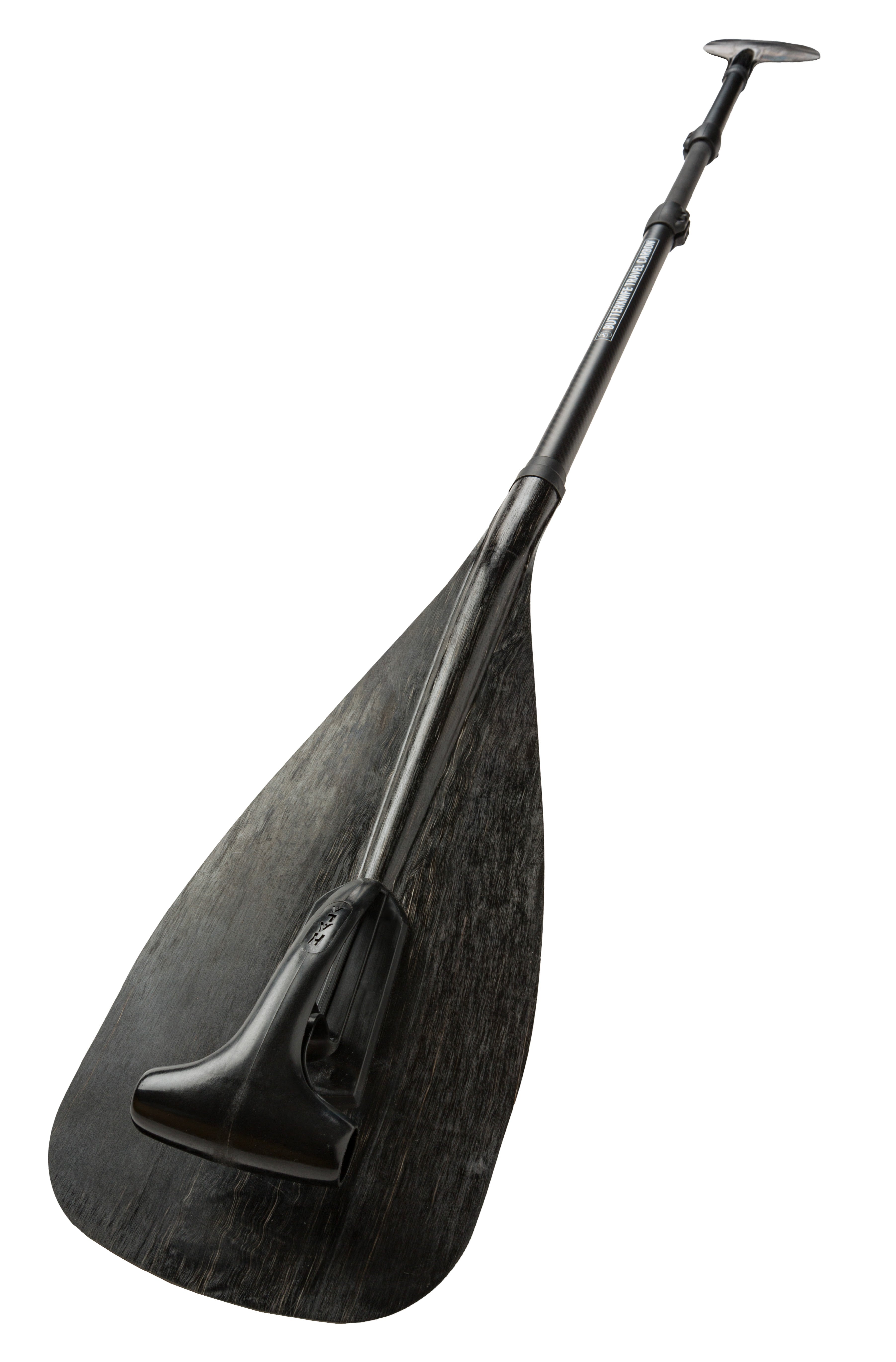 Fully assembled Hala Butterknife Travel Carbon paddle in black, shown from a low angle with a close-up of the blade and handle, highlighting its dual use as a kayak and stand-up paddle.