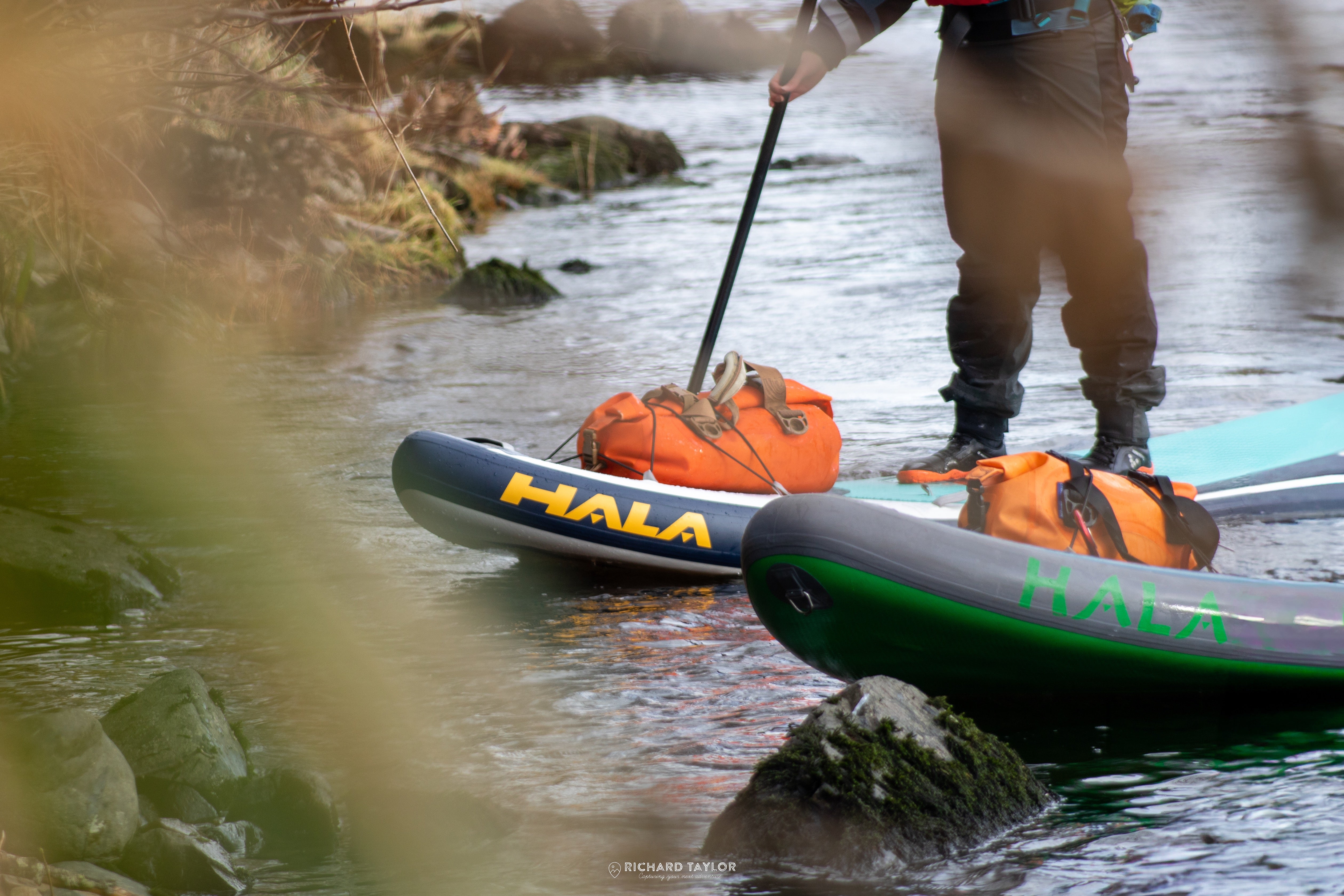 Hala Atcha whitewater SUP with StompBox retractable fin
